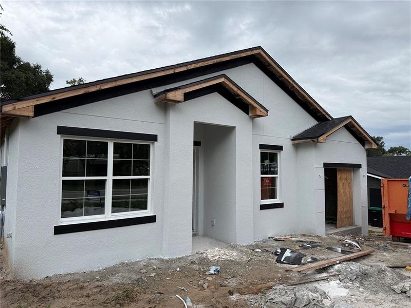 Front exterior of a new home in , Apopka, FL, highlighting curb appeal (Image 1). Front exterior of a new home in , Apopka, FL, highlighting curb appeal (Image 1).