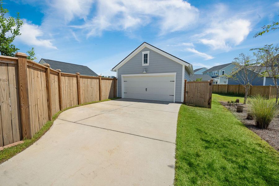 Front exterior of a new home in , Summerville, SC, highlighting curb appeal (Image 2).