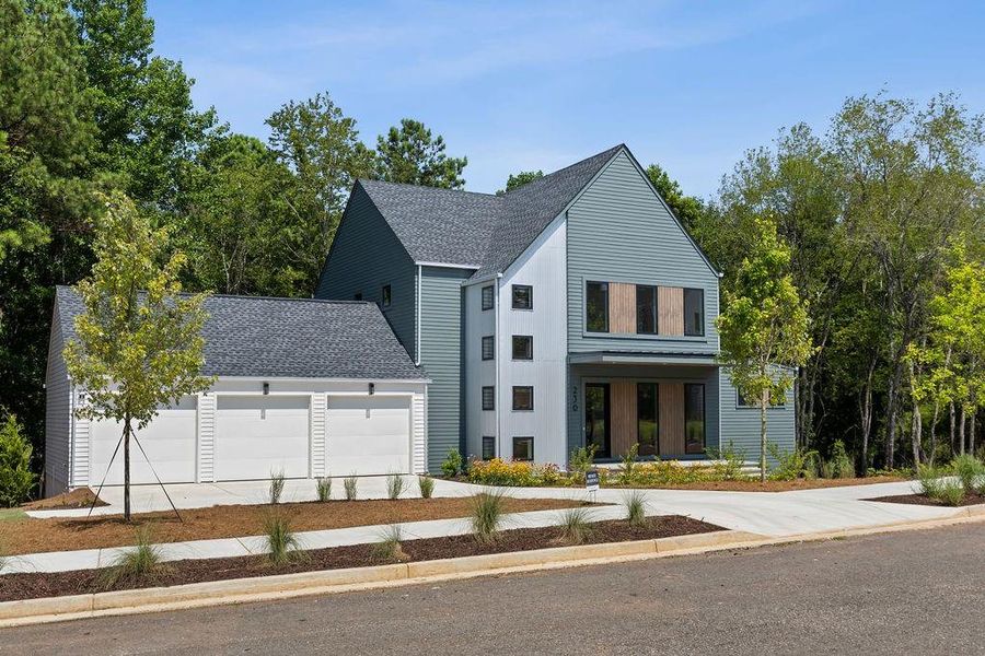 Front exterior of a new home in Aster, Roswell, GA, highlighting curb appeal (Image 34).