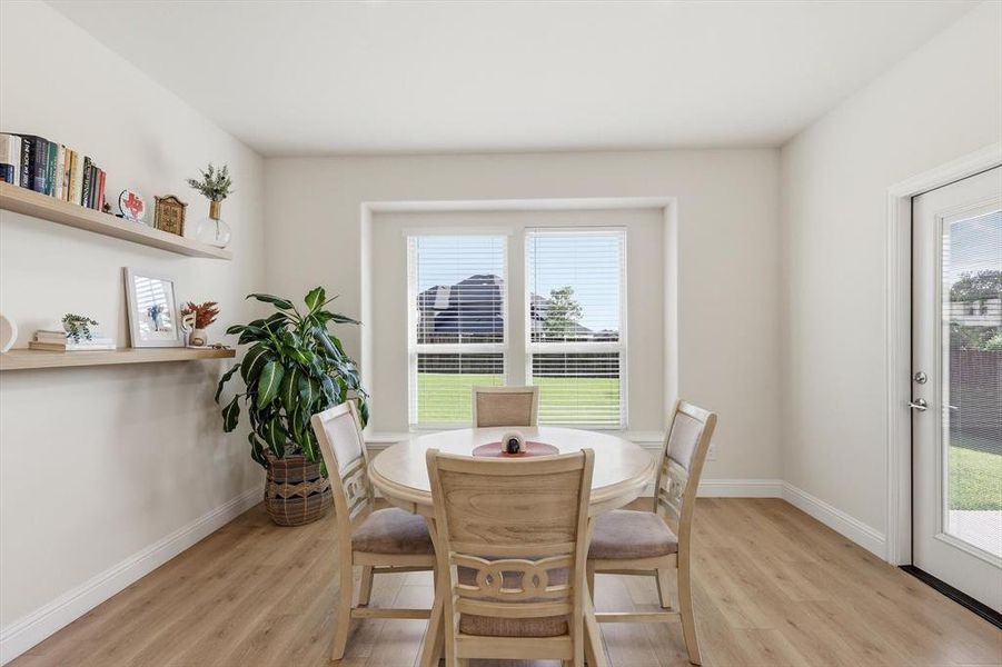 Enjoy morning coffee in the Breakfast area looking out into the back yard