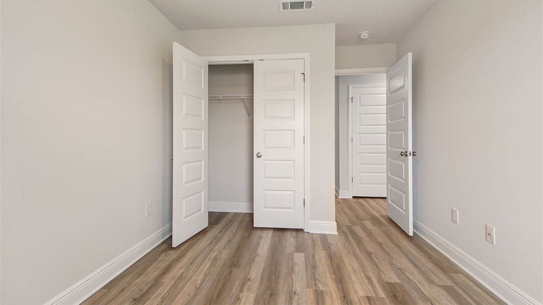 Representative unfurnished interior of a home built from the Palm Interior by D.R. Horton in Caballeros Estates Townhomes at Hombre, Panama City Beach (Image 33). Representative unfurnished interior of a home built from the Palm Interior by D.R. Horton in Caballeros Estates Townhomes at Hombre, Panama City Beach (Image 33).