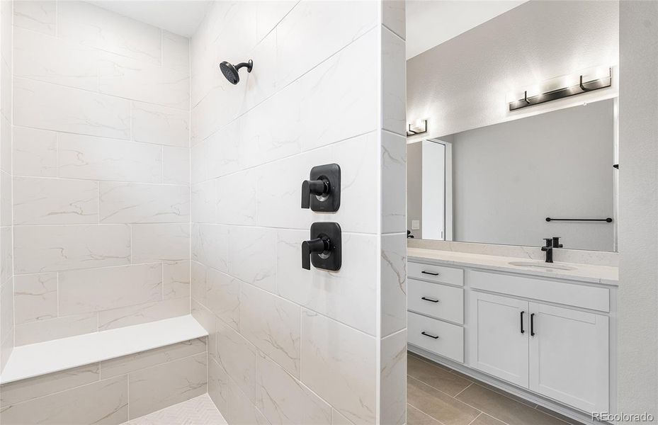 Furnished interior view inside a new home in Hilltop at Inspiration, Aurora (Image 13).