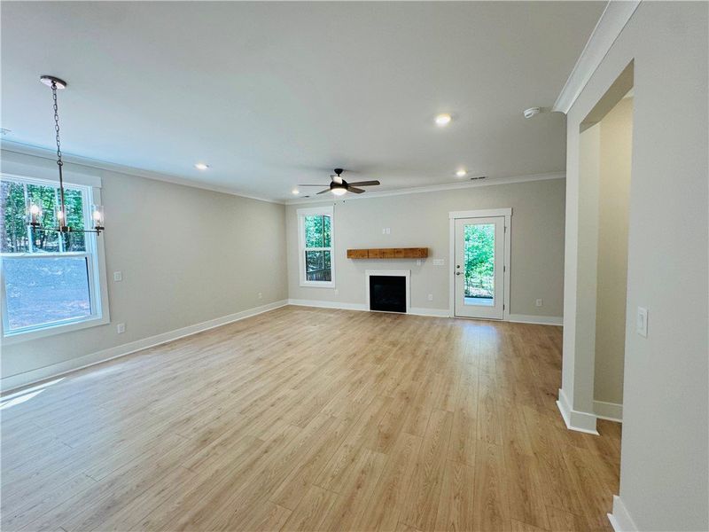 This expansive living area offers natural light an