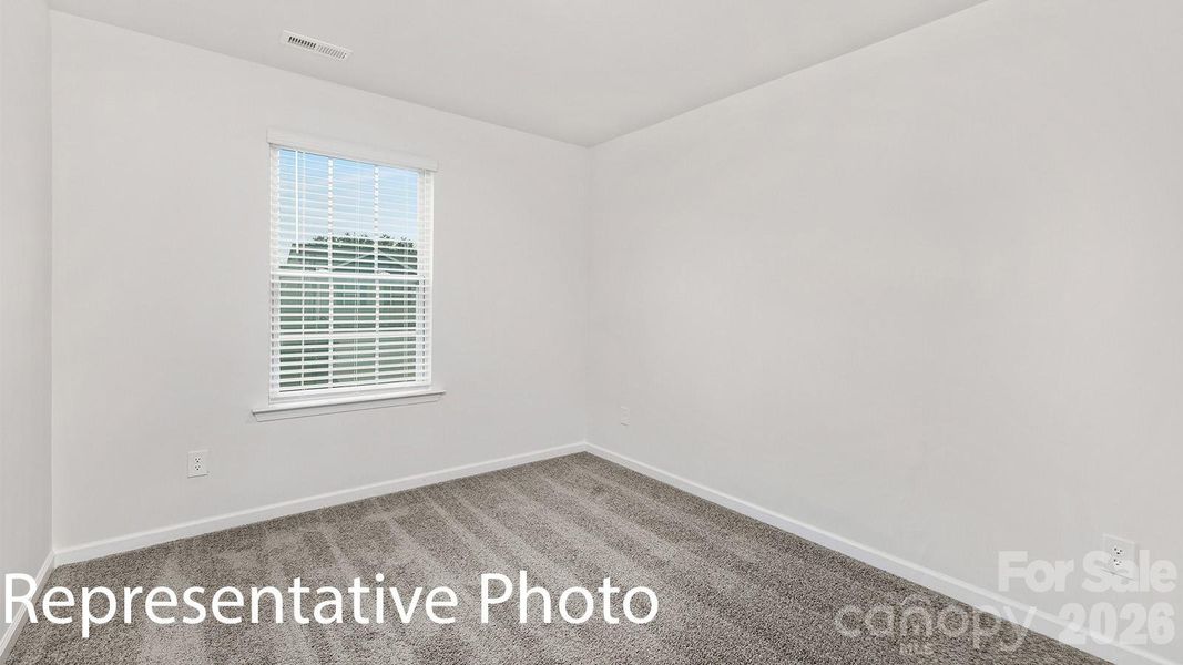 Spacious, unfurnished interior of a new home in Fergus Crossing, York (Image 19).