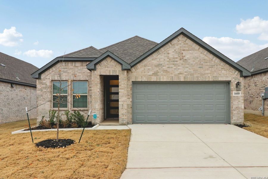 Front exterior of a new home in Kallison Ranch, San Antonio, TX, highlighting curb appeal (Image 22).