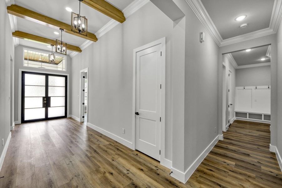 The secondary bedrooms and mud area are easily accessed from the main entry. The secondary bedrooms and mud area are easily accessed from the main entry.