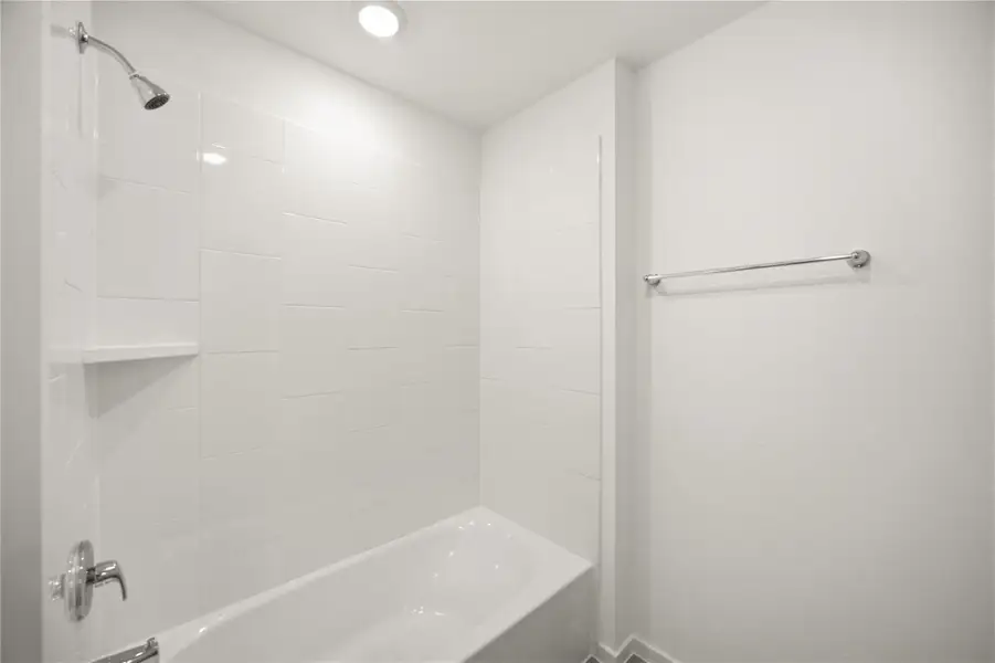 Full bath — Clean full bathroom with tub/shower combo and modern finishes. Full bath — Clean full bathroom with tub/shower combo and modern finishes.