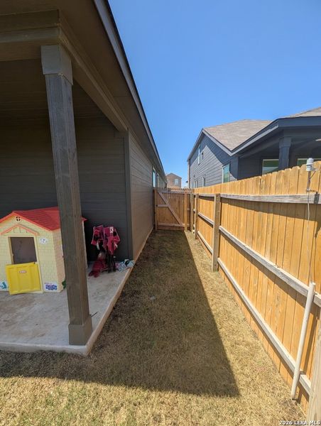 Exterior details and patio area of a home in Rose Valley, Converse (Image 23).