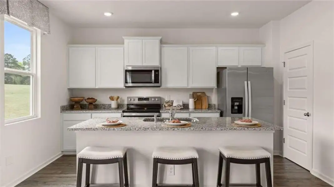 Furnished interior view inside a new home in Oakchase at Hampton, Hampton (Image 10).