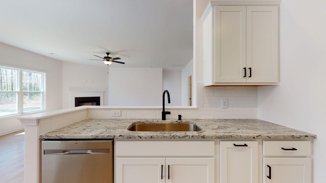 Representative furnished interior of a home built from the Catherine A by JC Jackson Homes,LLC in Heritage Pointe, Newport (Image 19).