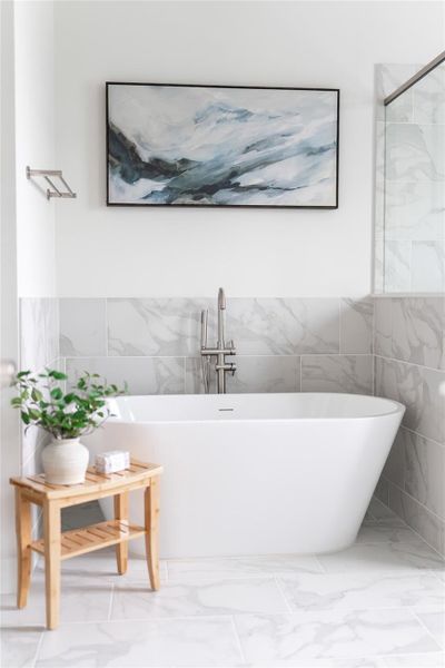 Freestanding soaking tub in the primary bathroom