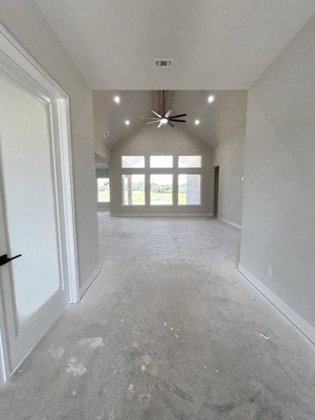 Grand Foyer entry into the soaring ceiling of the living room