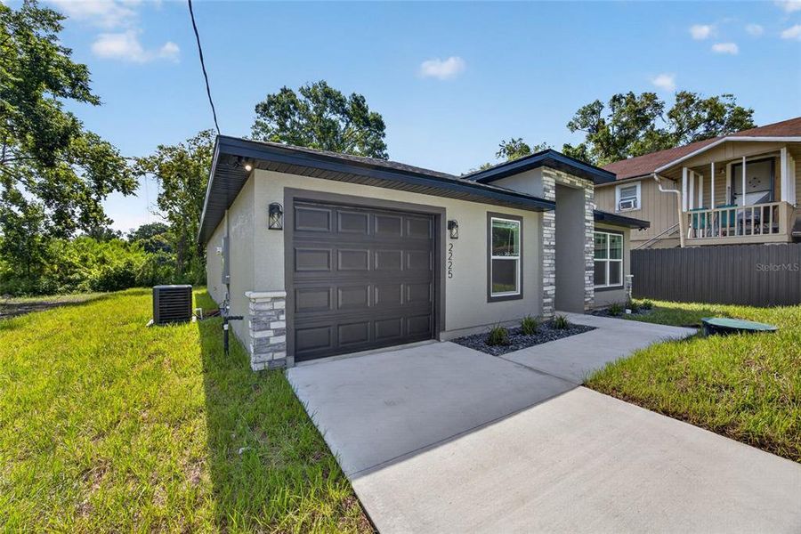 Front exterior of a new home in , Sanford, FL, highlighting curb appeal (Image 26). Front exterior of a new home in , Sanford, FL, highlighting curb appeal (Image 26).