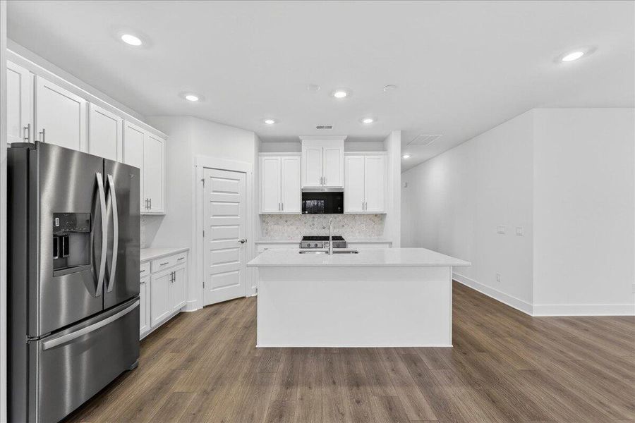 Furnished interior view inside a new home in The Coves at Lakes of Cane Bay, Summerville (Image 6).