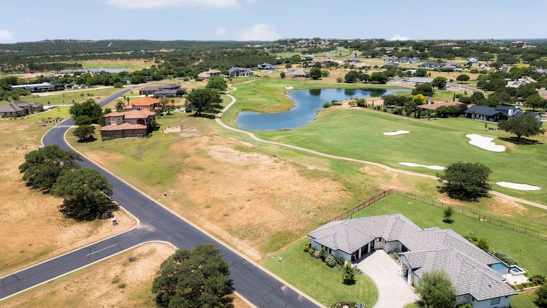 Aerial view of lot and nearby pond. Aerial view of lot and nearby pond.