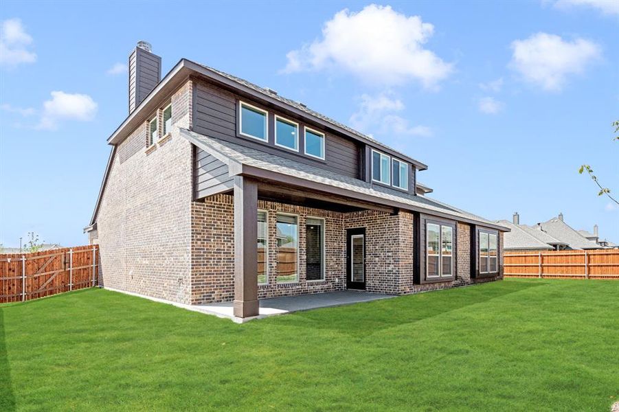 Front exterior of a new home in The Oasis at North Grove 75-80, Waxahachie, TX, highlighting curb appeal (Image 27). Front exterior of a new home in The Oasis at North Grove 75-80, Waxahachie, TX, highlighting curb appeal (Image 27).