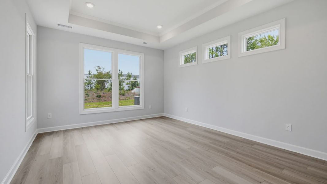 Spacious, unfurnished interior of a new home in The Courtyards at Oak Grove, Durham (Image 31).