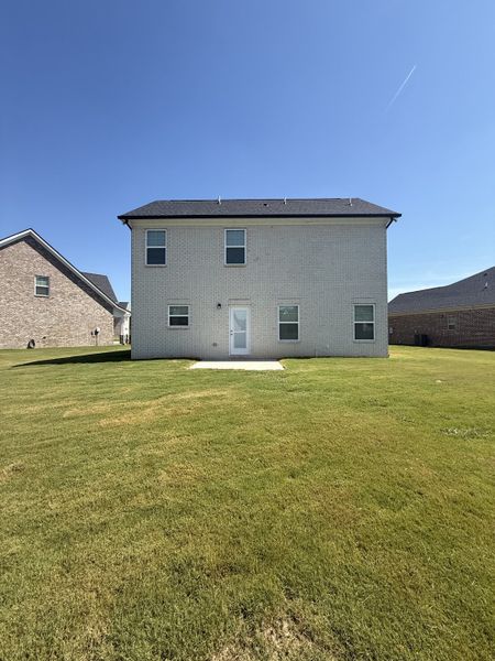 Front exterior of a new home in Bradley Bend, Ashland City, TN, highlighting curb appeal (Image 11).