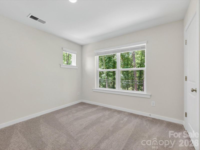 Spacious, unfurnished interior of a new home in Central Living at Craig, Charlotte (Image 23).