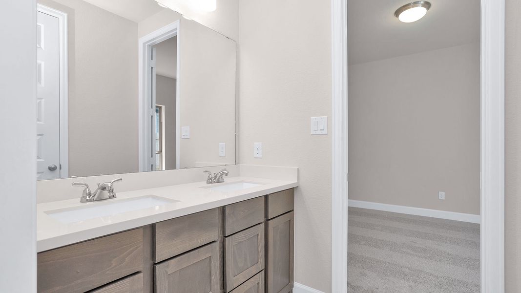 Furnished interior view inside a new home in The Highlands, Porter (Image 6).