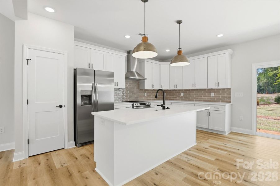 kitchen comes complete w/ upgrades quartz countertops, stainless steel hood vent (vented outside), porcelain farmhouse sink, soft close cabinetry, & more! kitchen comes complete w/ upgrades quartz countertops, stainless steel hood vent (vented outside), porcelain farmhouse sink, soft close cabinetry, & more!