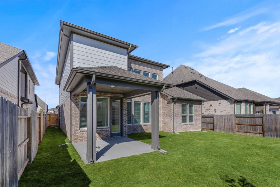 Exterior details and patio area of a home in Fulbrook on Fulshear Creek 60', Fulshear (Image 2). Exterior details and patio area of a home in Fulbrook on Fulshear Creek 60', Fulshear (Image 2).