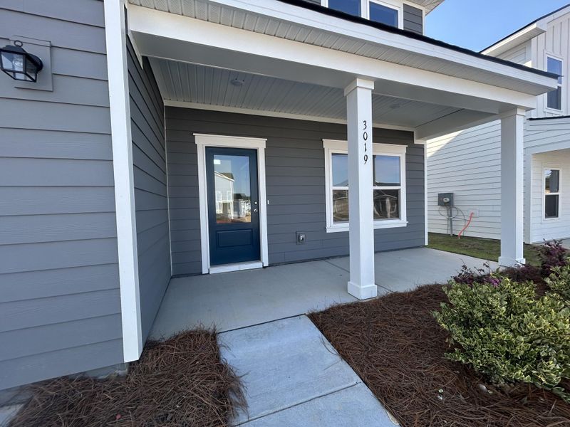 Exterior details and patio area of a home in , Ravenel (Image 3).