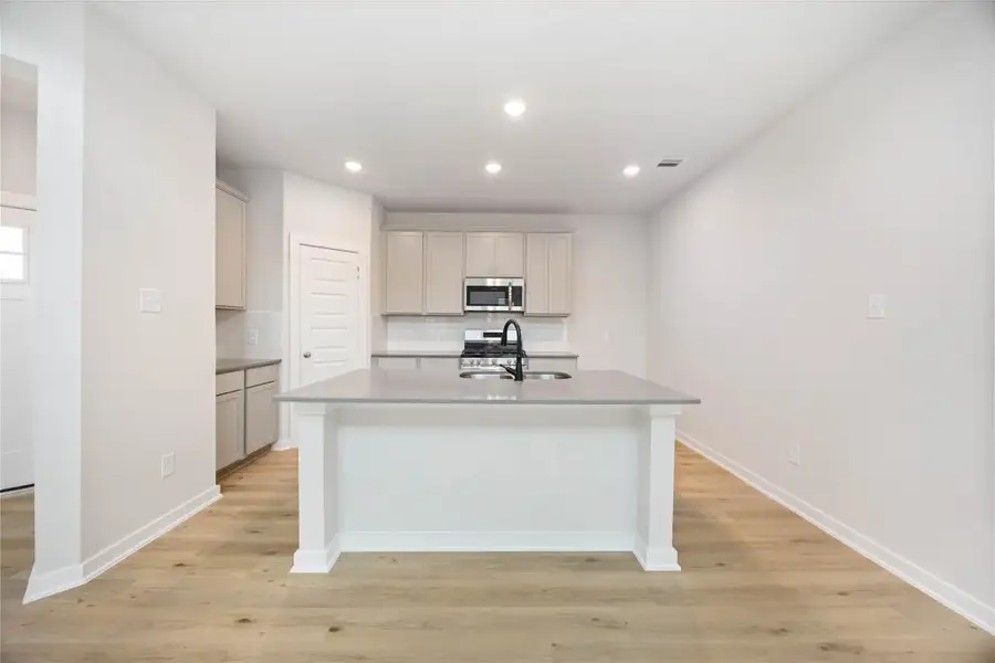 Furnished interior view inside a new home in Bluebonnet Village, Bellville (Image 6). Furnished interior view inside a new home in Bluebonnet Village, Bellville (Image 6).