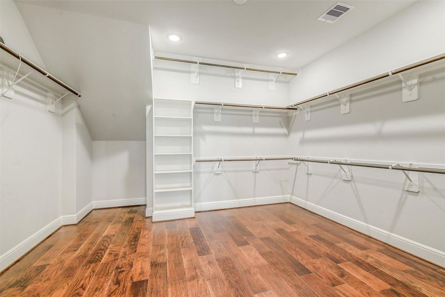 This closet is amazing measuring 13x14 with a little extra space for storage. Notice the high rod for off season storage. This closet is amazing measuring 13x14 with a little extra space for storage. Notice the high rod for off season storage.