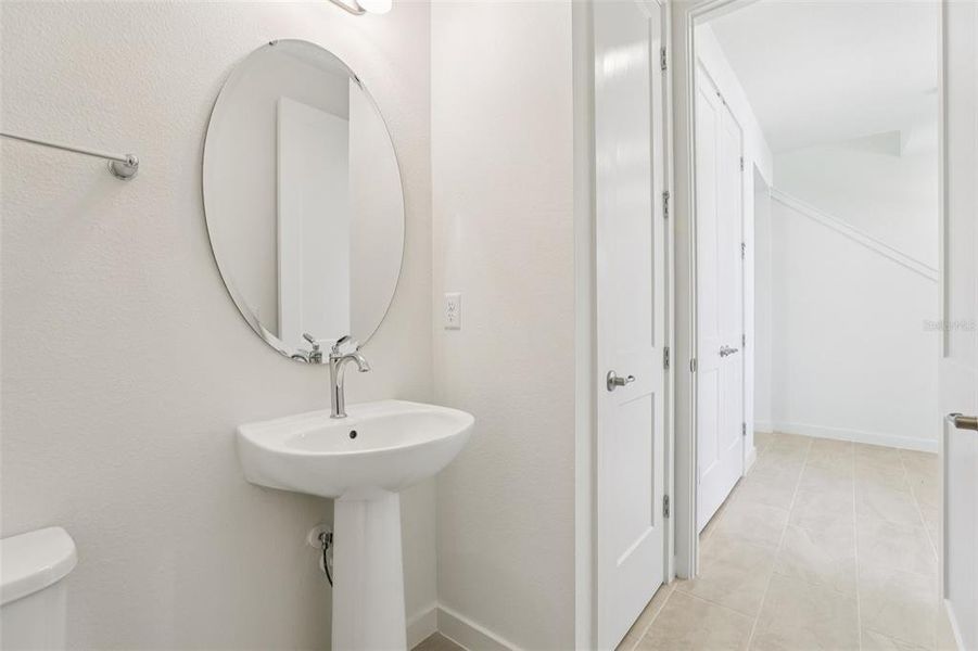 Furnished interior view inside a new home in Trinity Place, St. Cloud (Image 12).