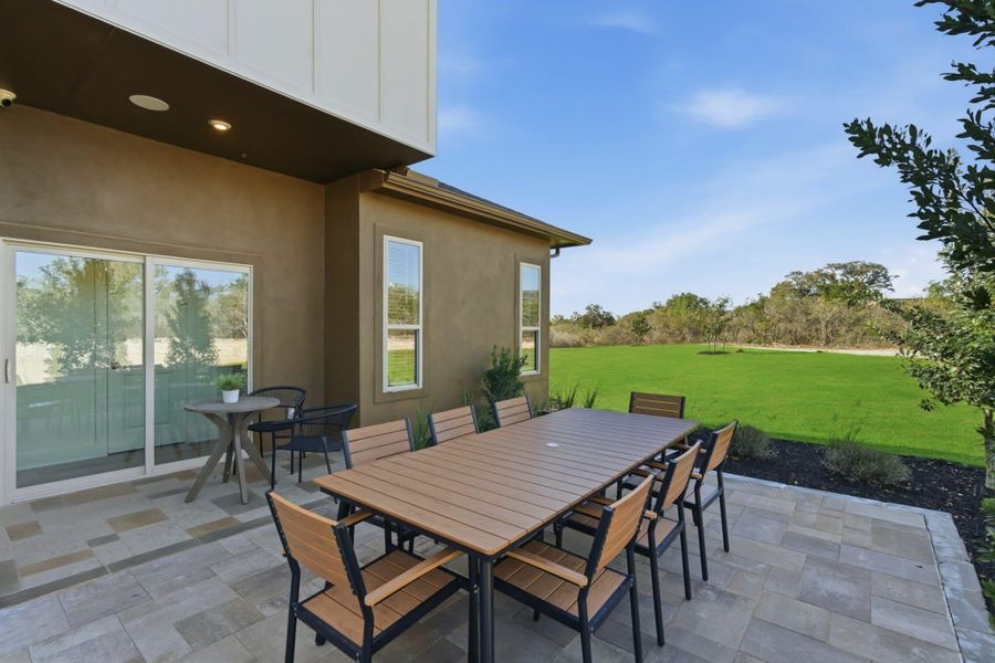 Exterior details and patio area of a home in Prominence, San Antonio (Image 28).