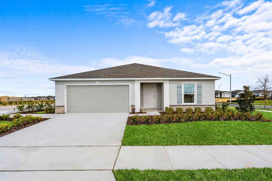 Representative exterior photo of a completed home built from the King by Holiday Builders in Poinciana, Poinciana, FL (Image 1). Representative exterior photo of a completed home built from the King by Holiday Builders in Poinciana, Poinciana, FL (Image 1).