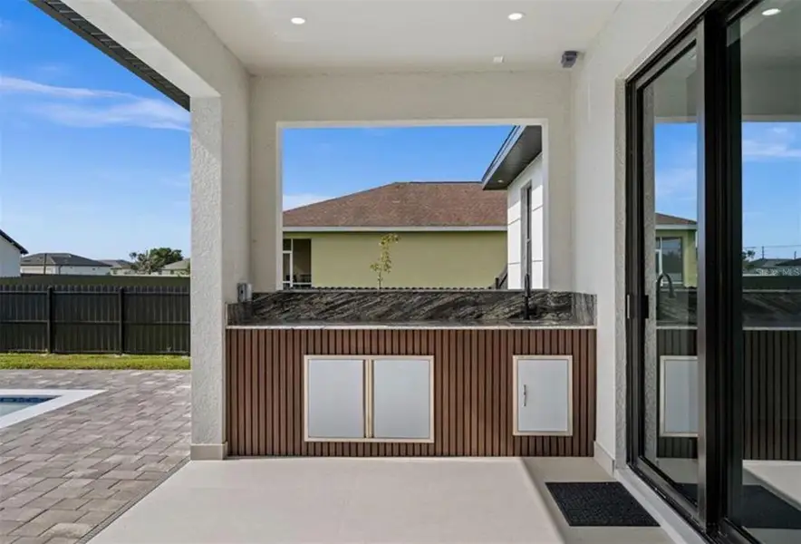 Exterior details and patio area of a home in , Cape Coral (Image 39). Exterior details and patio area of a home in , Cape Coral (Image 39).