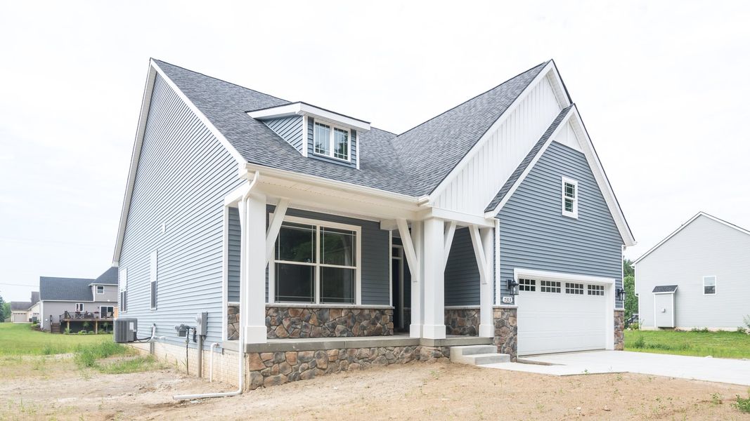 Representative exterior photo of a completed home built from the The Abington by Norfolk Homes in Valleys, Jackson, MI (Image 31).