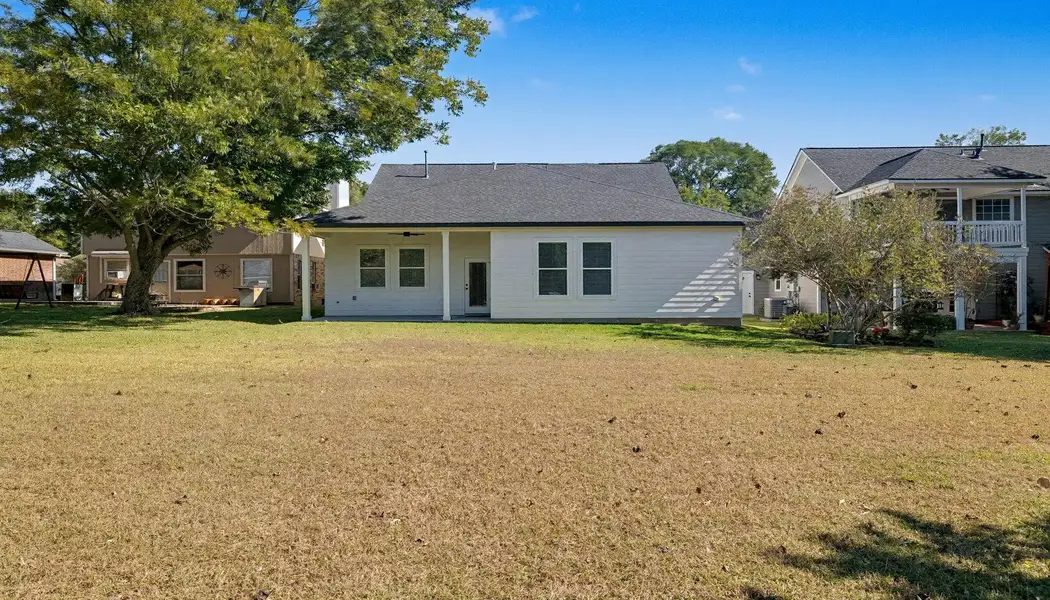 Exterior details and patio area of a home in , Willis (Image 4). Exterior details and patio area of a home in , Willis (Image 4).