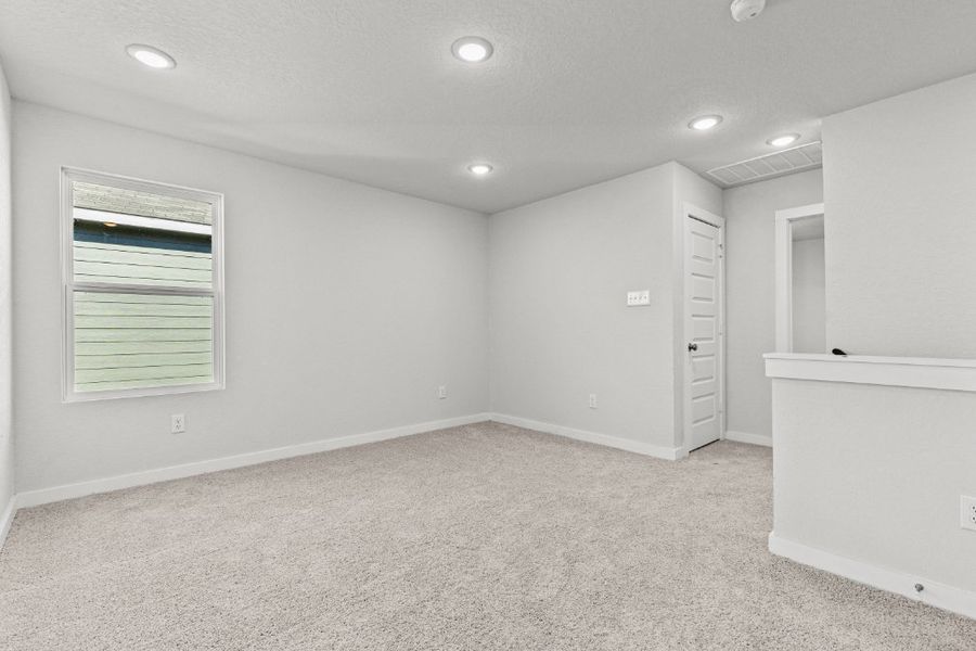 A room with white walls and a white cabinet. A room with white walls and a white cabinet.