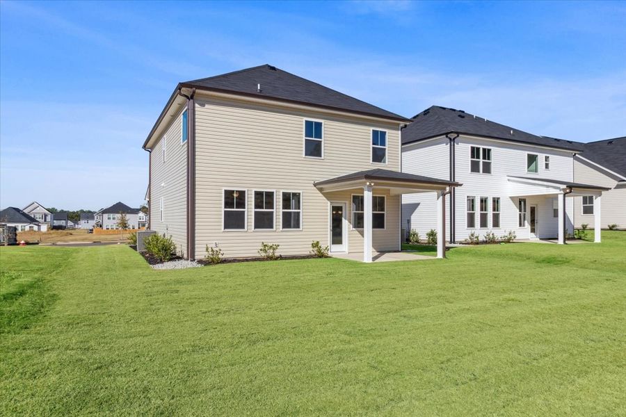 Exterior details and patio area of a home in Windsor, North Augusta (Image 22).