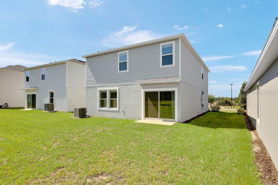 Exterior details and patio area of a home in Waterstone, Groveland (Image 28). Exterior details and patio area of a home in Waterstone, Groveland (Image 28).