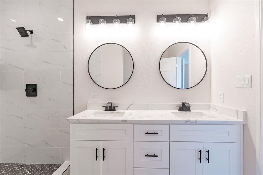 Bathroom featuring dual vanity