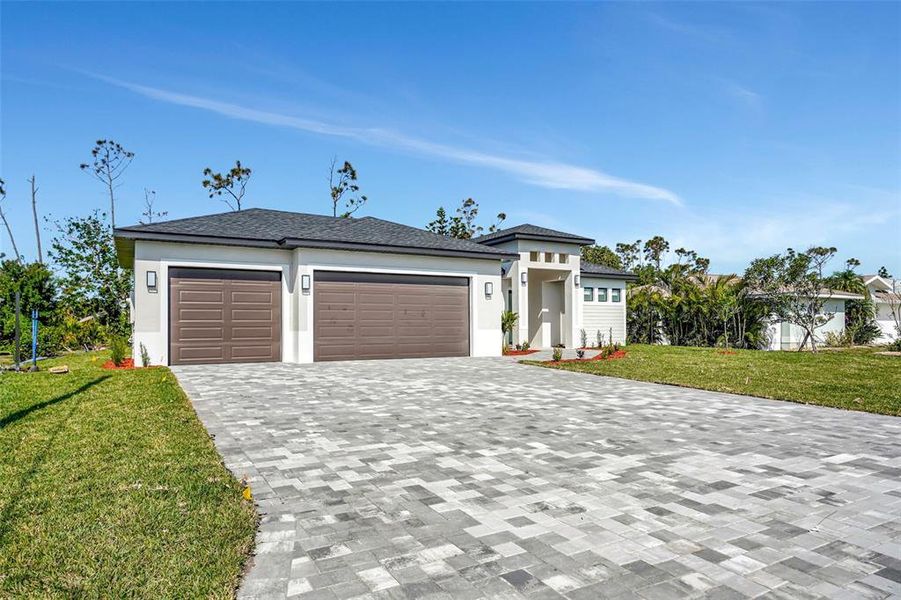 Front exterior of a new home in , Rotonda West, FL, highlighting curb appeal (Image 29).