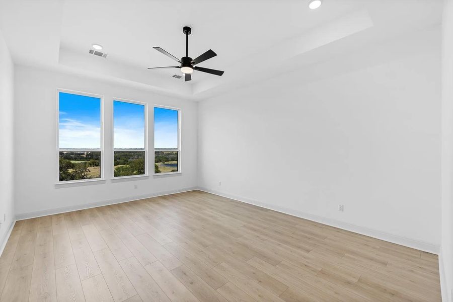 Spacious, unfurnished interior of a new home in Lariat - 80', Liberty Hill (Image 13). Spacious, unfurnished interior of a new home in Lariat - 80', Liberty Hill (Image 13).