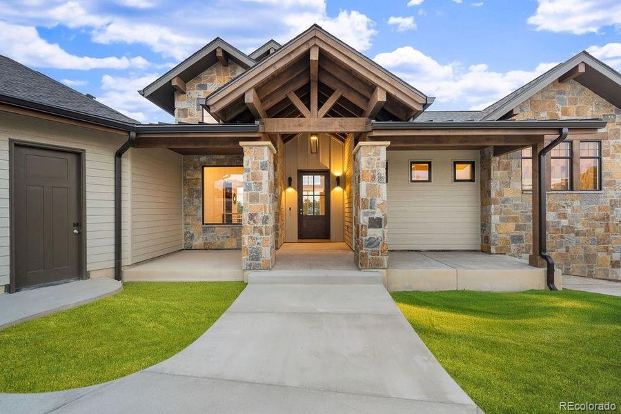 Front exterior of a new home in , Parker, CO, highlighting curb appeal (Image 23).
