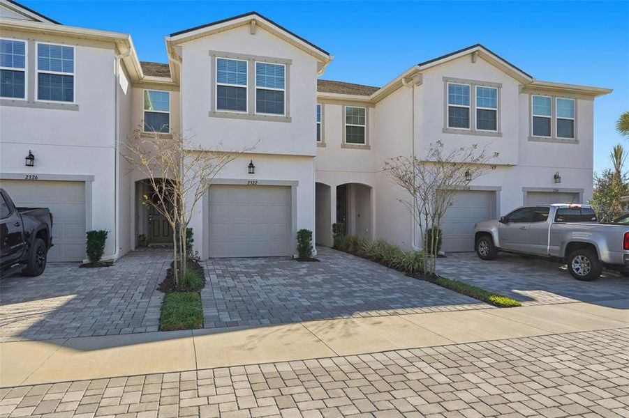 Front exterior of a new home in , Lutz, FL, highlighting curb appeal (Image 23).