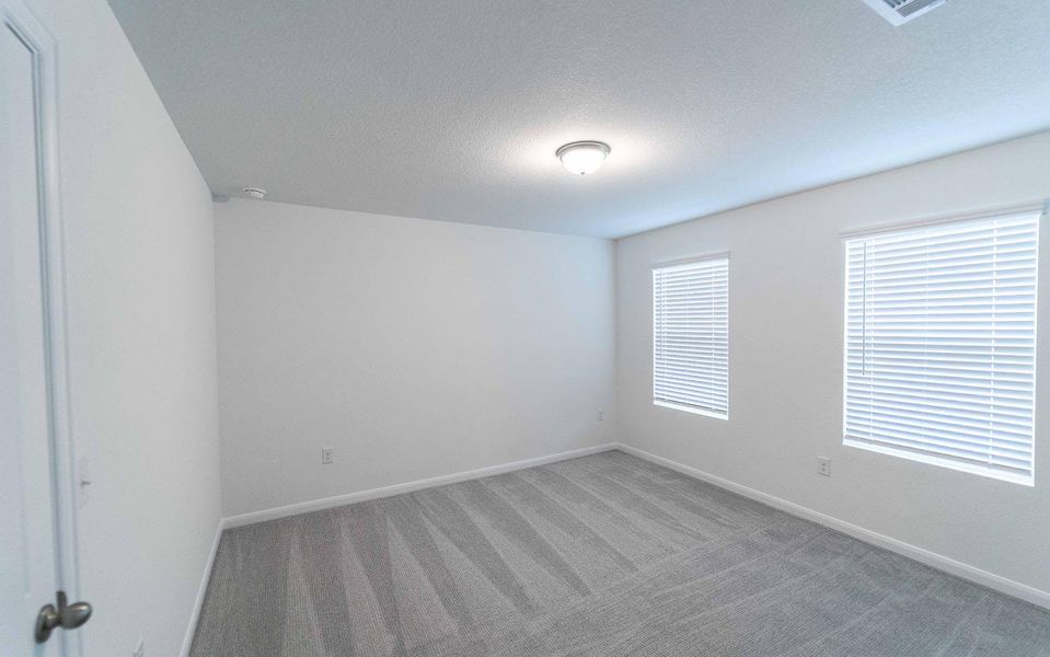 Spacious, unfurnished interior of a new home in Brooklands, Hutto (Image 8).