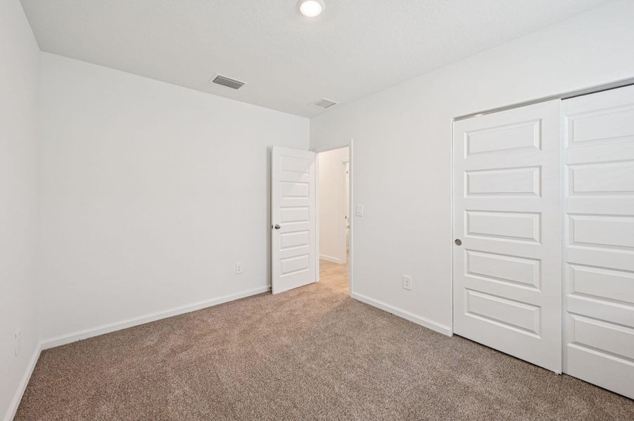 Spacious, unfurnished interior of a new home in Hampton Park - Classic Series, Vero Beach (Image 17). Spacious, unfurnished interior of a new home in Hampton Park - Classic Series, Vero Beach (Image 17).