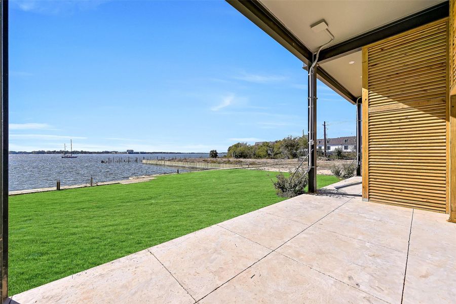Exterior details and patio area of a home in Lago Pointe, Seabrook (Image 24). Exterior details and patio area of a home in Lago Pointe, Seabrook (Image 24).