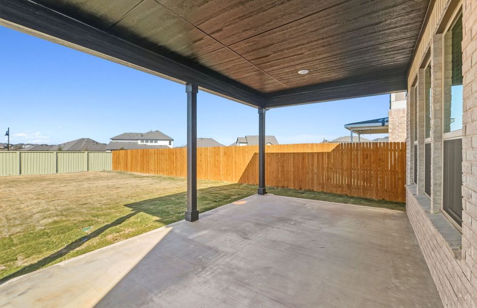Exterior details and patio area of a home in Santa Rita Ranch, Liberty Hill (Image 4).