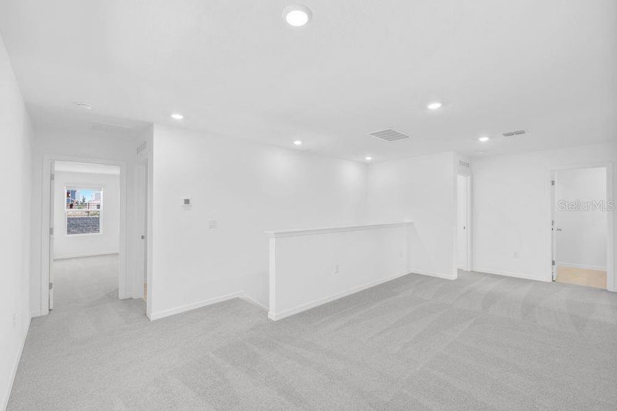 Spacious, unfurnished interior of a new home in Waterstone, Groveland (Image 38). Spacious, unfurnished interior of a new home in Waterstone, Groveland (Image 38).