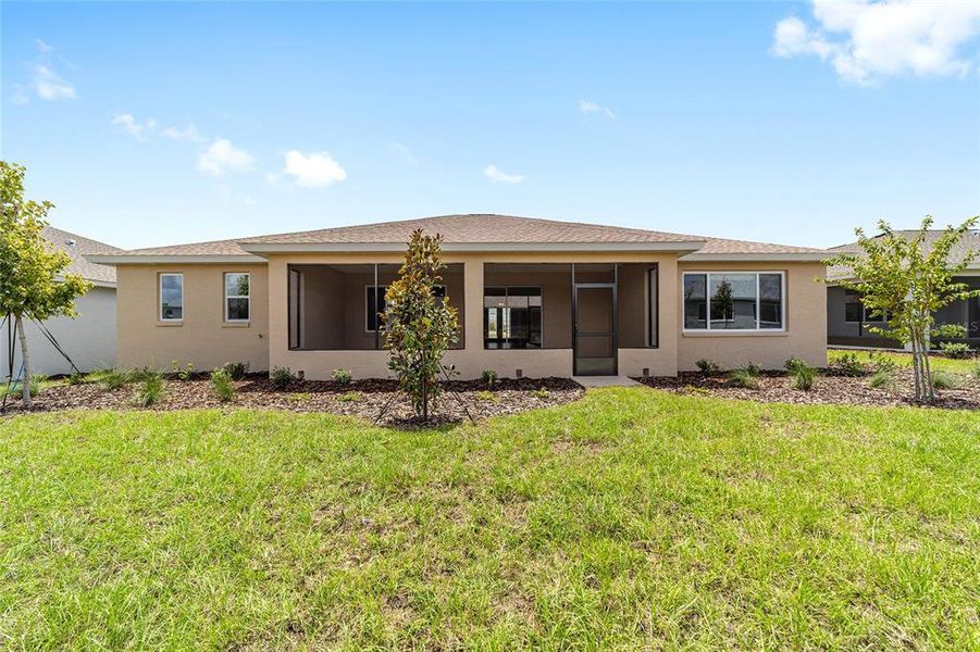 Exterior details and patio area of a home in On Top of the World Communities, Ocala (Image 4).