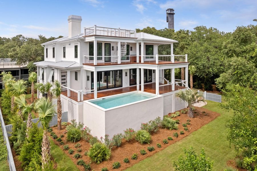 Exterior details and patio area of a home in , Sullivan's Island (Image 28). Exterior details and patio area of a home in , Sullivan's Island (Image 28).